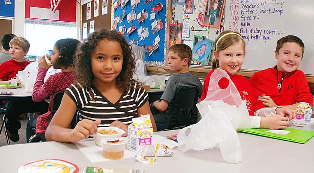 grade school kids in a lunchroom