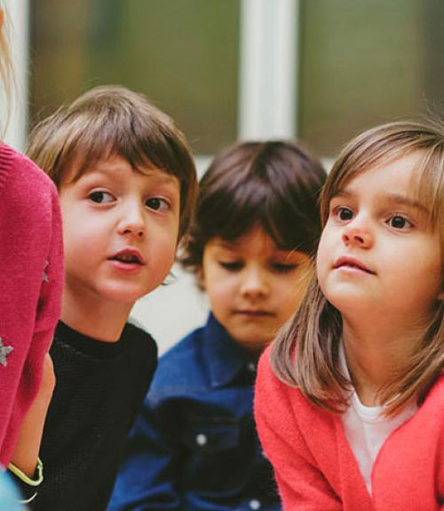 preschool kids listening to their teacher
