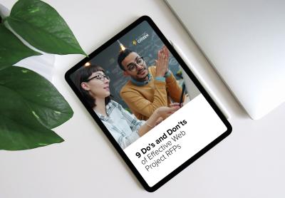 digital tablet on a white surface showing the cover of the report on the screen