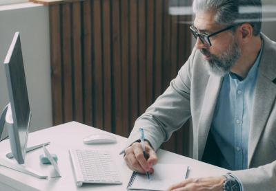 businessman at desk doing research
