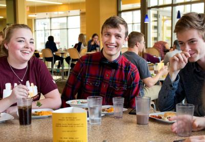 students hanging out together in a dining hall