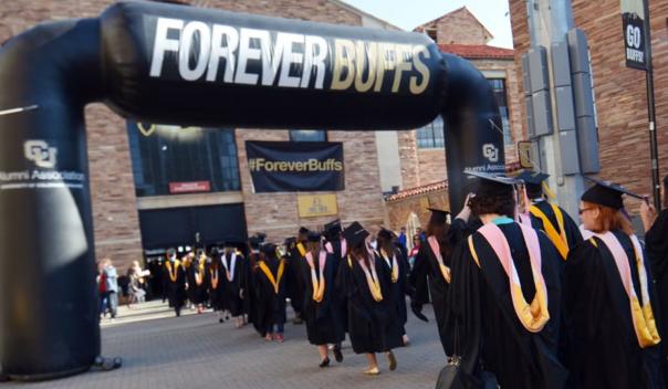 graduates of university in black gowns 