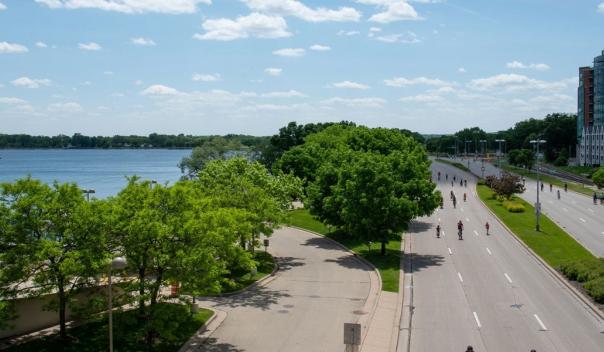 City of Madison, photo of trees and water alongside road
