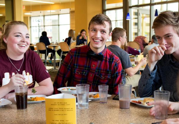 students hanging out together in a dining hall