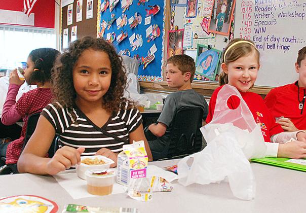 grade school kids in a lunchroom