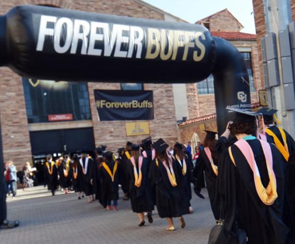 graduates of university in black gowns 