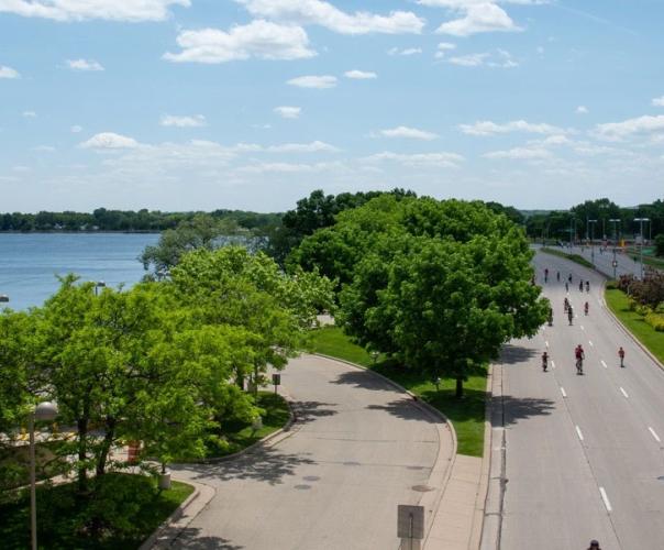 City of Madison, photo of trees and water alongside road